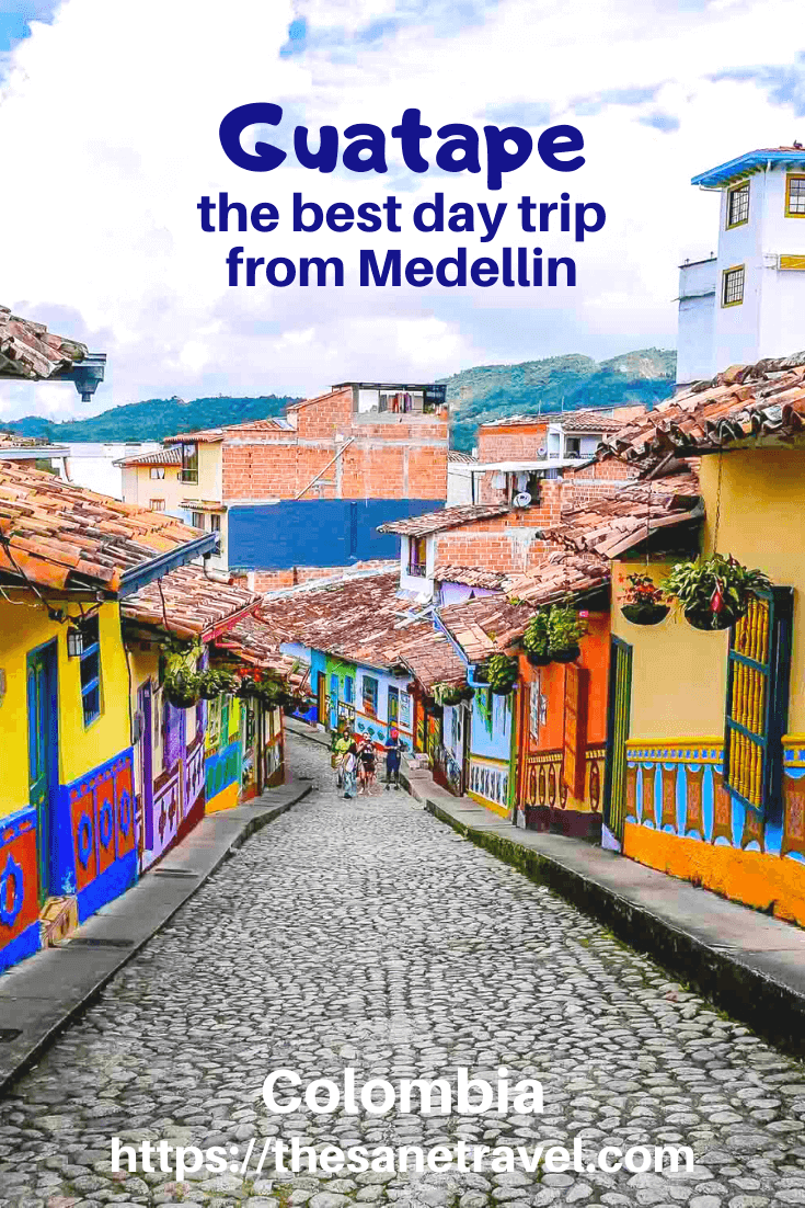 Guatape is a small town about two hours from Medellin. It is located next to a huge man-made lake. The new landscape made Guatape popular as a travel destination. Now it’s a lakeside village with many restaurants and water activities.  But first and foremost, it is known as one of the most colourful towns in Colombia, because of its colourful zocalos. For sure, Guatape day trip is the best you can take. #guatapedaytripfrommedellin #visitcolombia #travelblog #travelphotography
